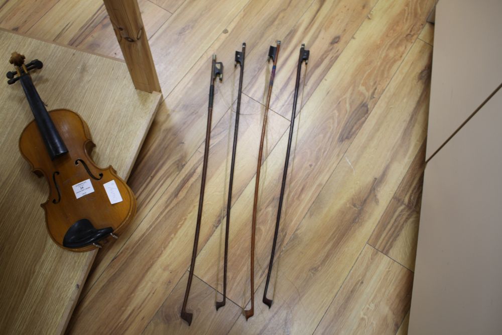 A Chinese violin and four bows